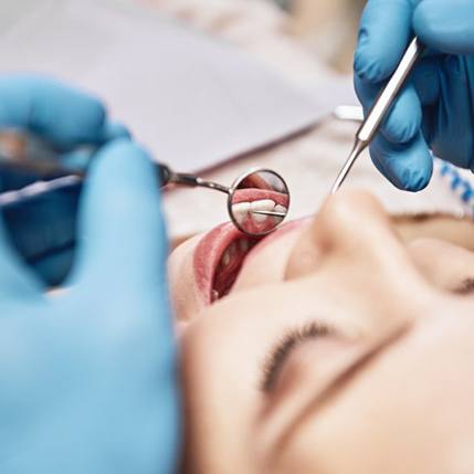 a patient undergoing a routine dental checkup
