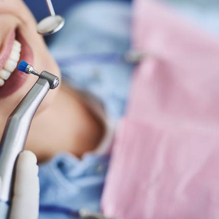a patient undergoing a dental cleaning