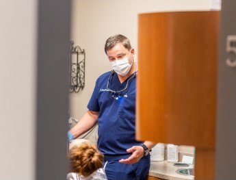 doctor speaking with patient in Marion