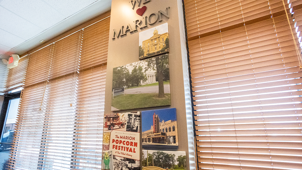 Collage of photos of Marion community on wall