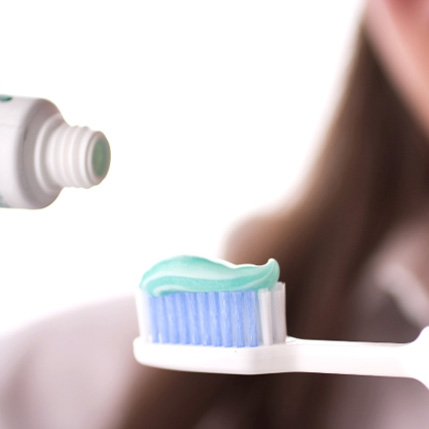 Brush with toothpaste
